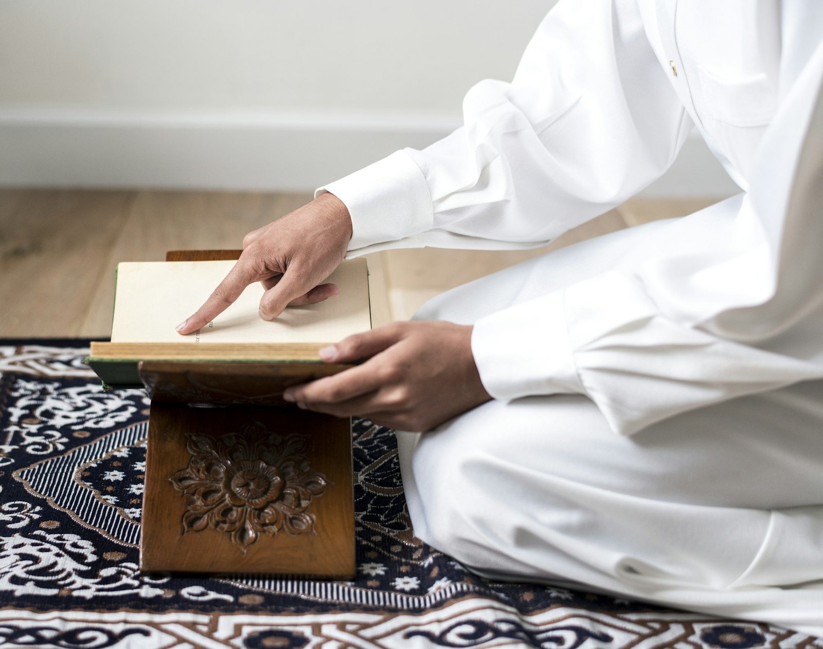 Muslim man studying The Quran